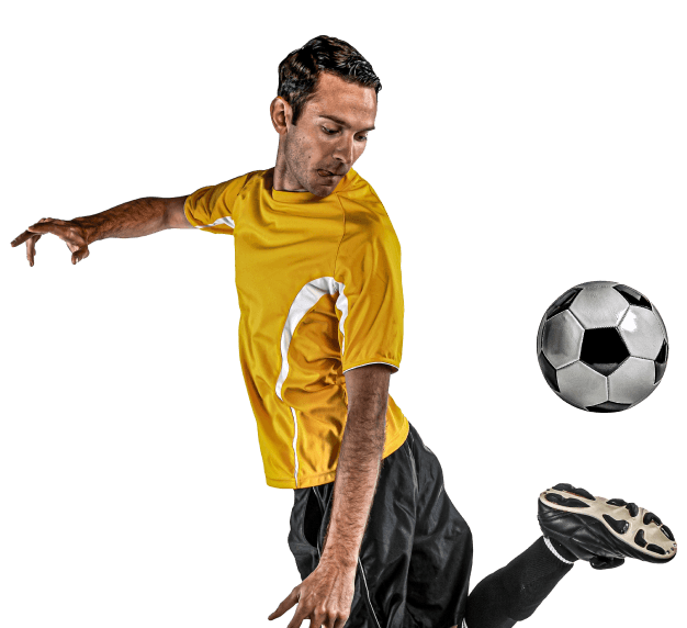 A football player kicking a ball at high-speed