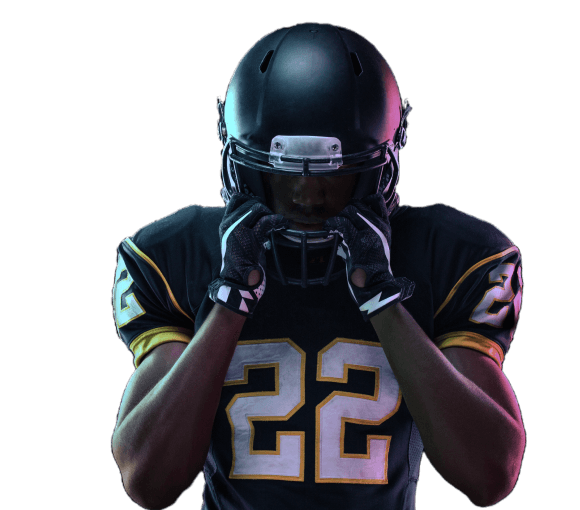 A football player kicking a ball at high-speed